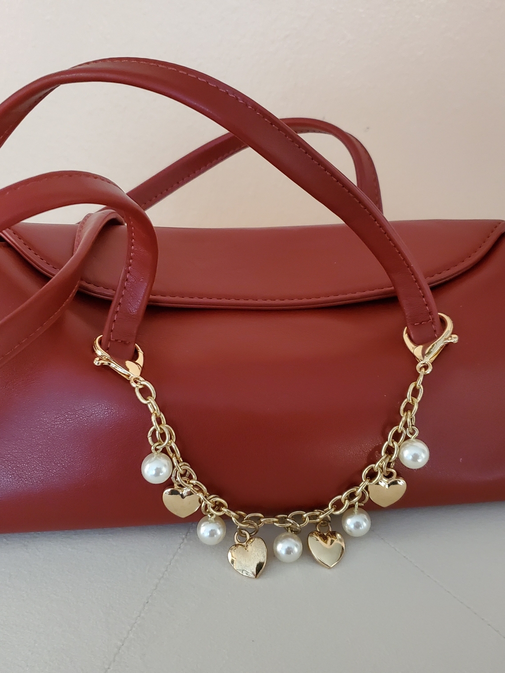 Urban Expressions Red Barrel Crossbody Pearl Charm